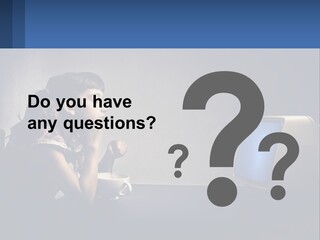 A Little Girl Sitting In Front Of A Computer PowerPoint Template