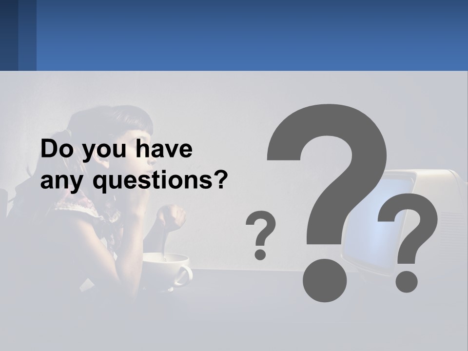 A Little Girl Sitting In Front Of A Computer PowerPoint Template