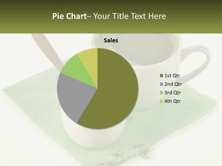 A Cup Of Green Tea Next To A Spoon PowerPoint Template