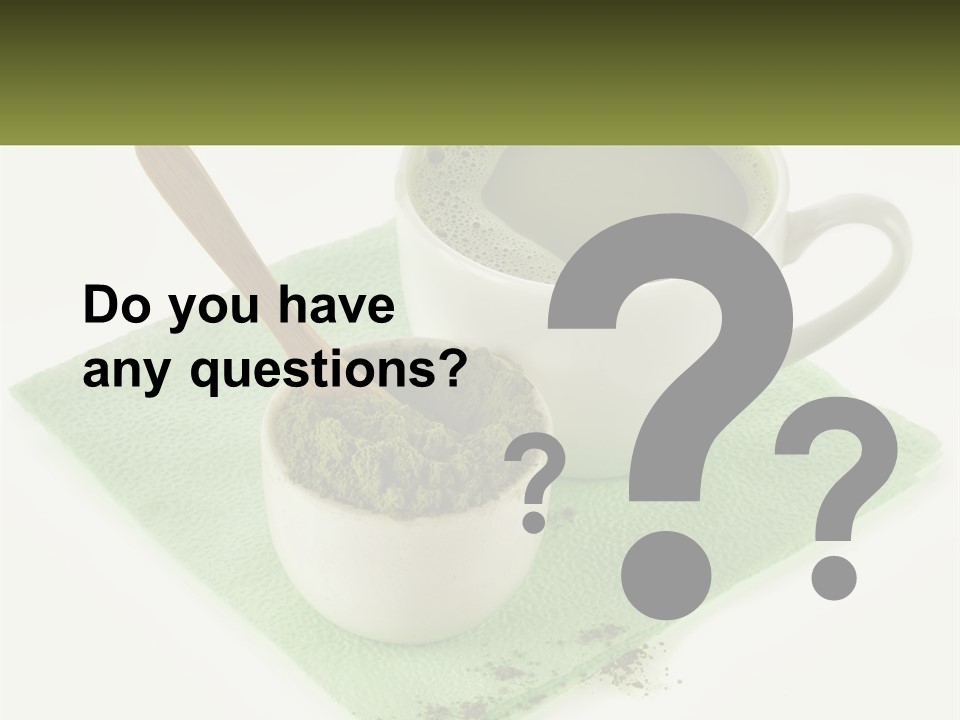 A Cup Of Green Tea Next To A Spoon PowerPoint Template