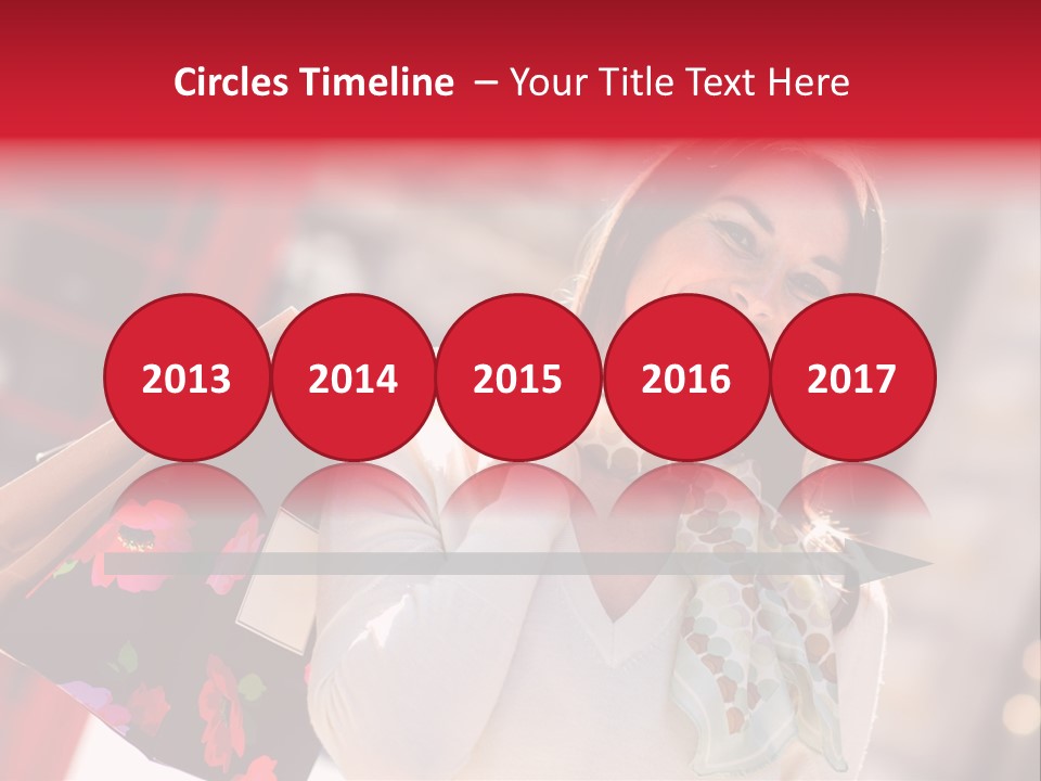 A Woman Carrying Shopping Bags And A Red Telephone Booth PowerPoint Template