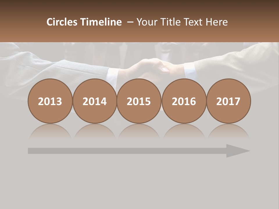 Two Men Shaking Hands In Front Of A Group Of People PowerPoint Template