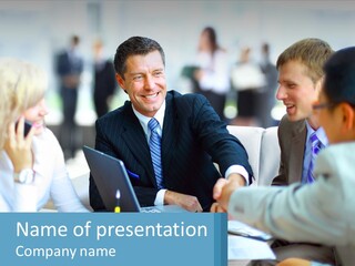 A Group Of People Sitting Around A Table Shaking Hands PowerPoint Template