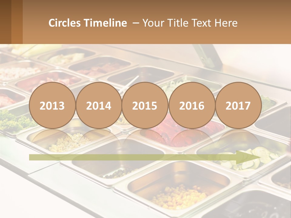 A Buffet Table With Many Trays Of Food PowerPoint Template