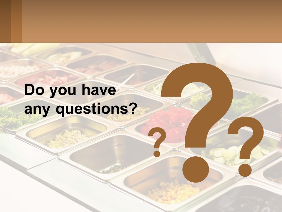 A Buffet Table With Many Trays Of Food PowerPoint Template