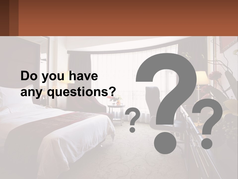 A Bed Room With A Neatly Made Bed And A Chair PowerPoint Template