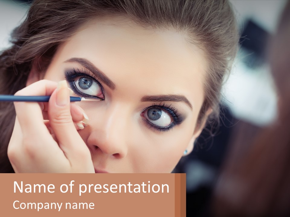 A Woman With Blue Eyes Is Doing Makeup PowerPoint Template