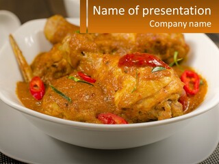 A White Bowl Filled With Food On Top Of A Table PowerPoint Template