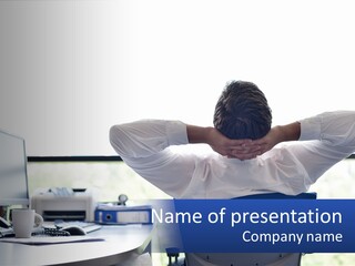 A Man Sitting At A Desk With His Head In His Hands PowerPoint Template