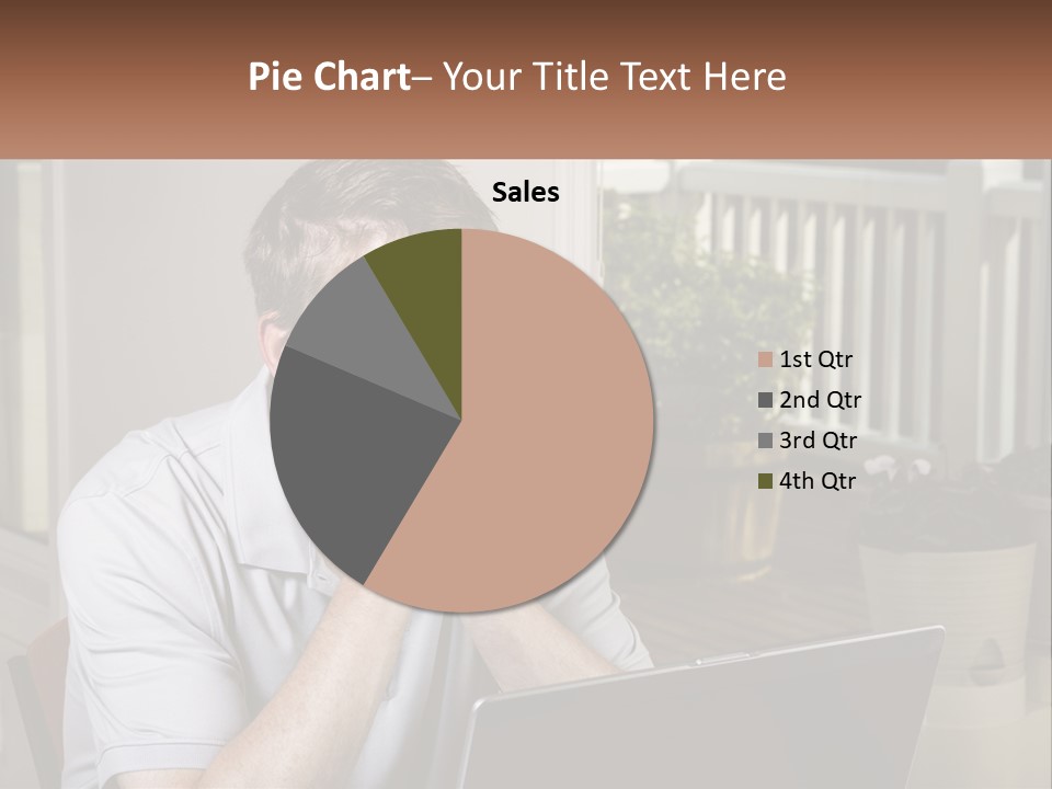 A Man Sitting At A Table With A Laptop In Front Of Him PowerPoint Template