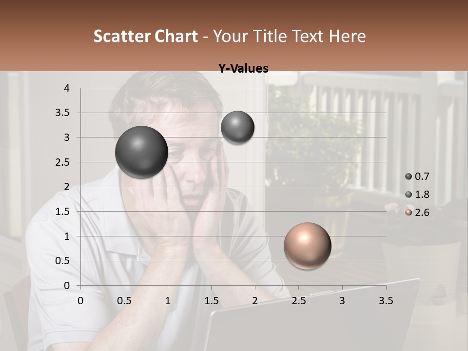 A Man Sitting At A Table With A Laptop In Front Of Him PowerPoint Template