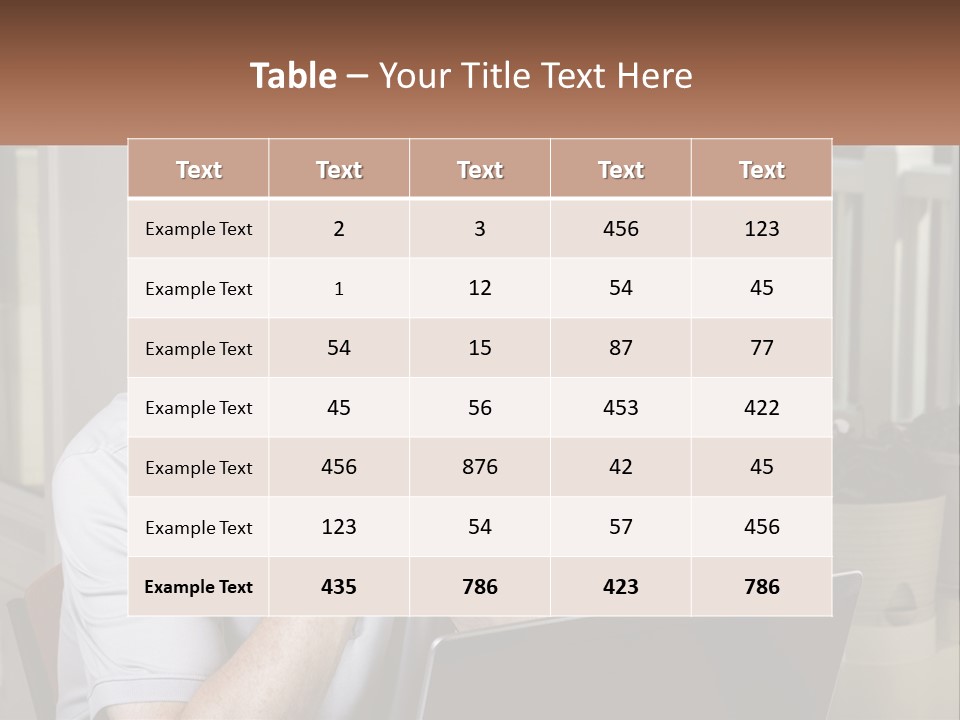 A Man Sitting At A Table With A Laptop In Front Of Him PowerPoint Template
