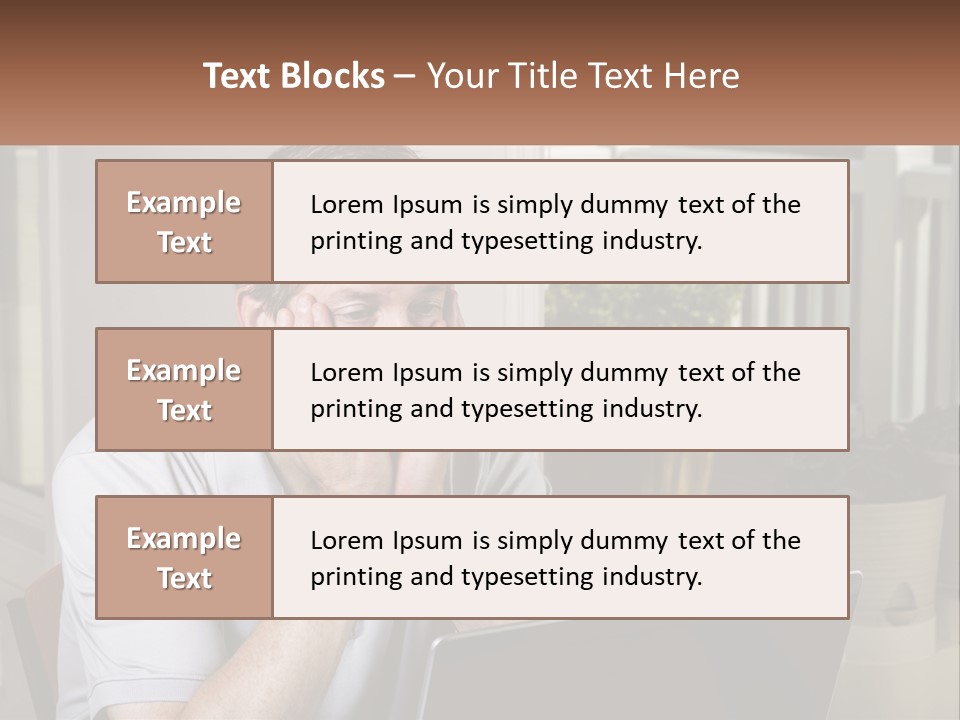 A Man Sitting At A Table With A Laptop In Front Of Him PowerPoint Template