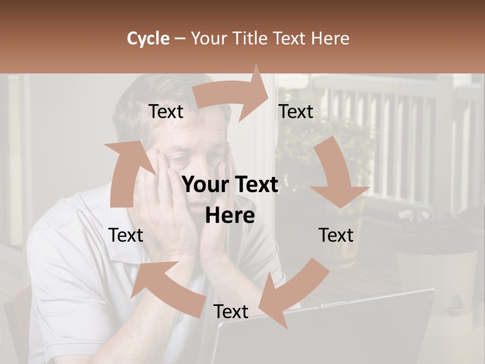 A Man Sitting At A Table With A Laptop In Front Of Him PowerPoint Template