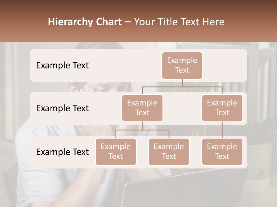 A Man Sitting At A Table With A Laptop In Front Of Him PowerPoint Template