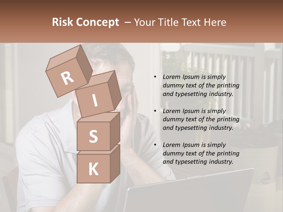 A Man Sitting At A Table With A Laptop In Front Of Him PowerPoint Template