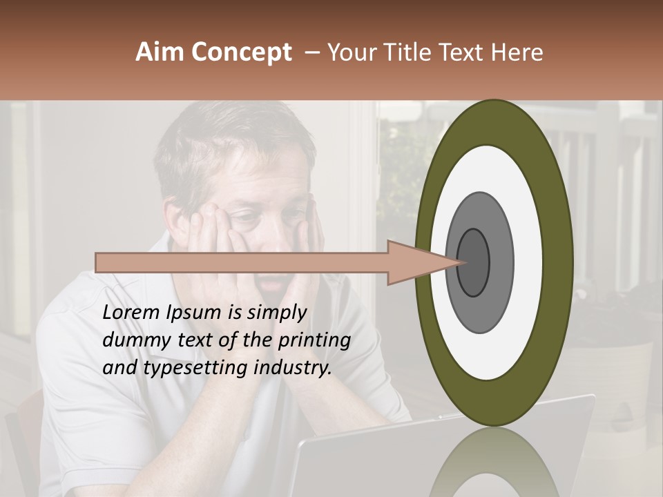 A Man Sitting At A Table With A Laptop In Front Of Him PowerPoint Template