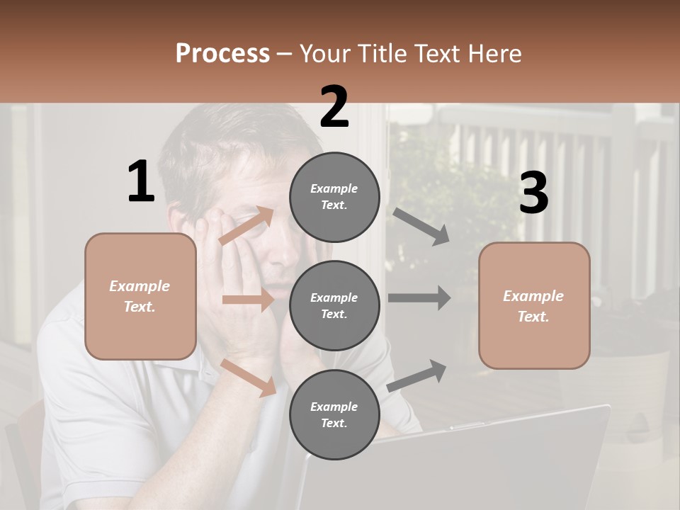 A Man Sitting At A Table With A Laptop In Front Of Him PowerPoint Template
