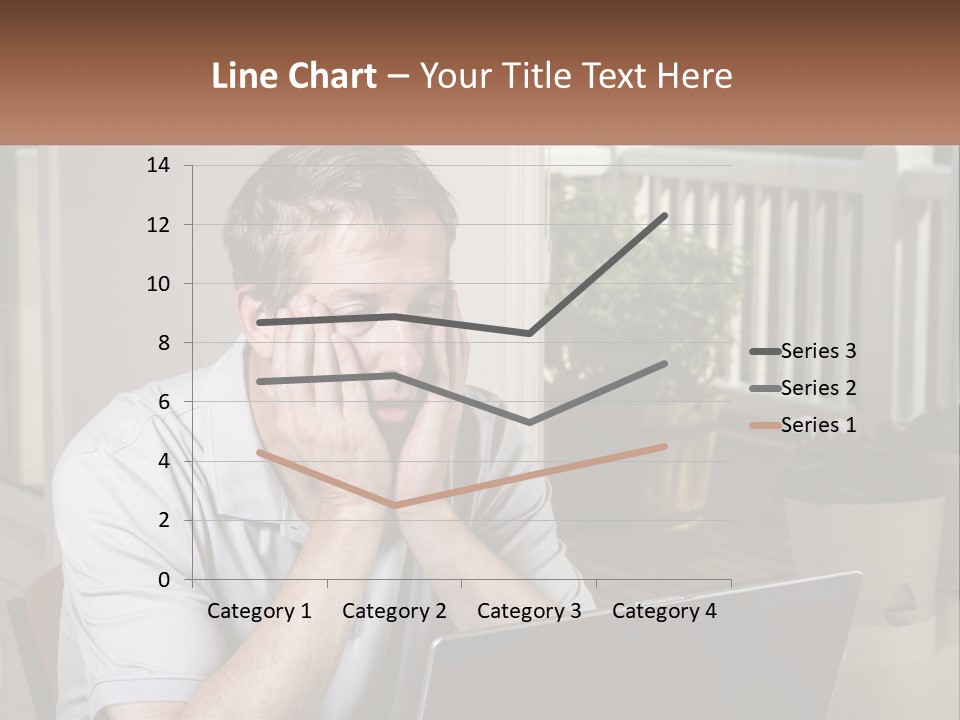 A Man Sitting At A Table With A Laptop In Front Of Him PowerPoint Template