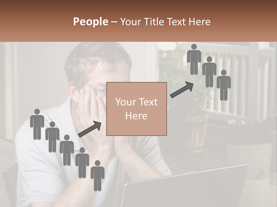 A Man Sitting At A Table With A Laptop In Front Of Him PowerPoint Template