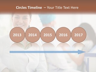 A Woman In A White Shirt Is Standing In A Hospital PowerPoint Template