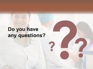 A Woman In A White Shirt Is Standing In A Hospital PowerPoint Template