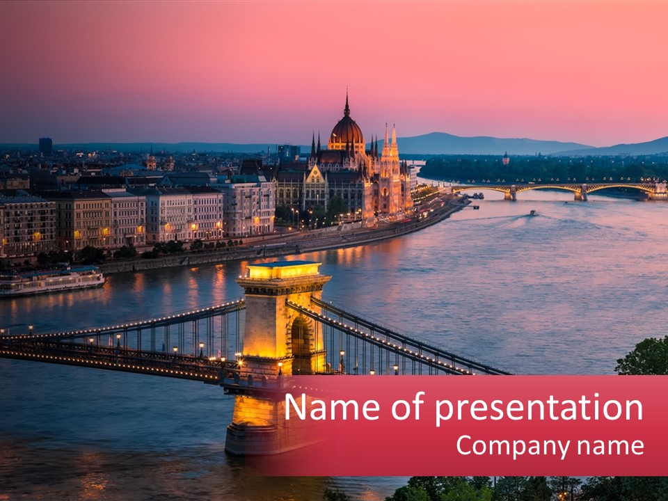 A Bridge Over A River With A City In The Background PowerPoint Template