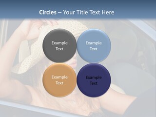 A Woman In A Hat And Sunglasses Sitting In A Car PowerPoint Template