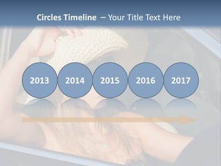 A Woman In A Hat And Sunglasses Sitting In A Car PowerPoint Template
