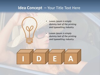 A Woman In A Hat And Sunglasses Sitting In A Car PowerPoint Template