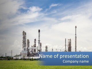 A Power Plant In The Middle Of A Green Field PowerPoint Template