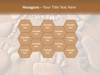 A Group Of Rocks Sitting On Top Of A Sandy Ground PowerPoint Template