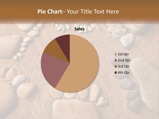 A Group Of Rocks Sitting On Top Of A Sandy Ground PowerPoint Template