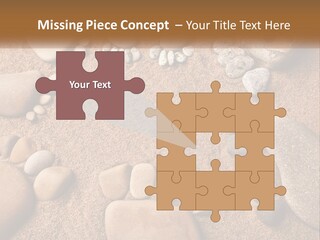 A Group Of Rocks Sitting On Top Of A Sandy Ground PowerPoint Template