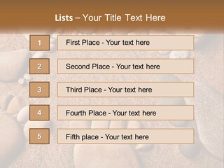 A Group Of Rocks Sitting On Top Of A Sandy Ground PowerPoint Template