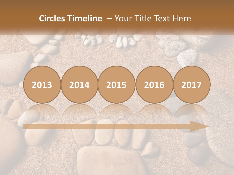 A Group Of Rocks Sitting On Top Of A Sandy Ground PowerPoint Template