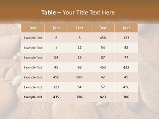 A Group Of Rocks Sitting On Top Of A Sandy Ground PowerPoint Template