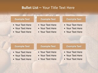 A Group Of Rocks Sitting On Top Of A Sandy Ground PowerPoint Template