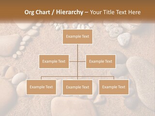 A Group Of Rocks Sitting On Top Of A Sandy Ground PowerPoint Template