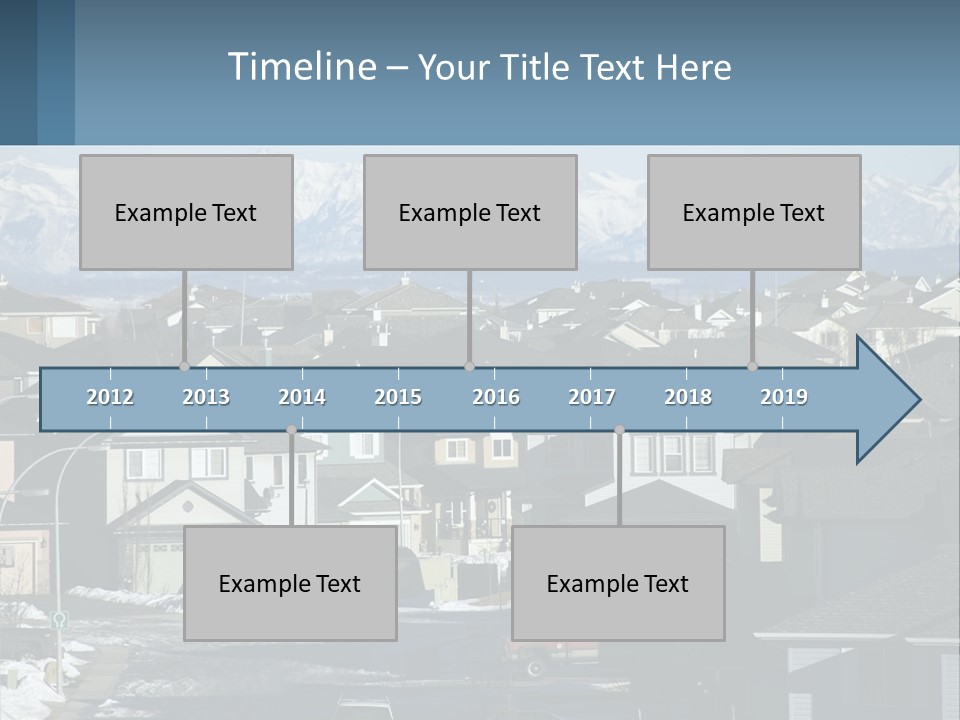 A Large Group Of Houses With Mountains In The Background PowerPoint Template