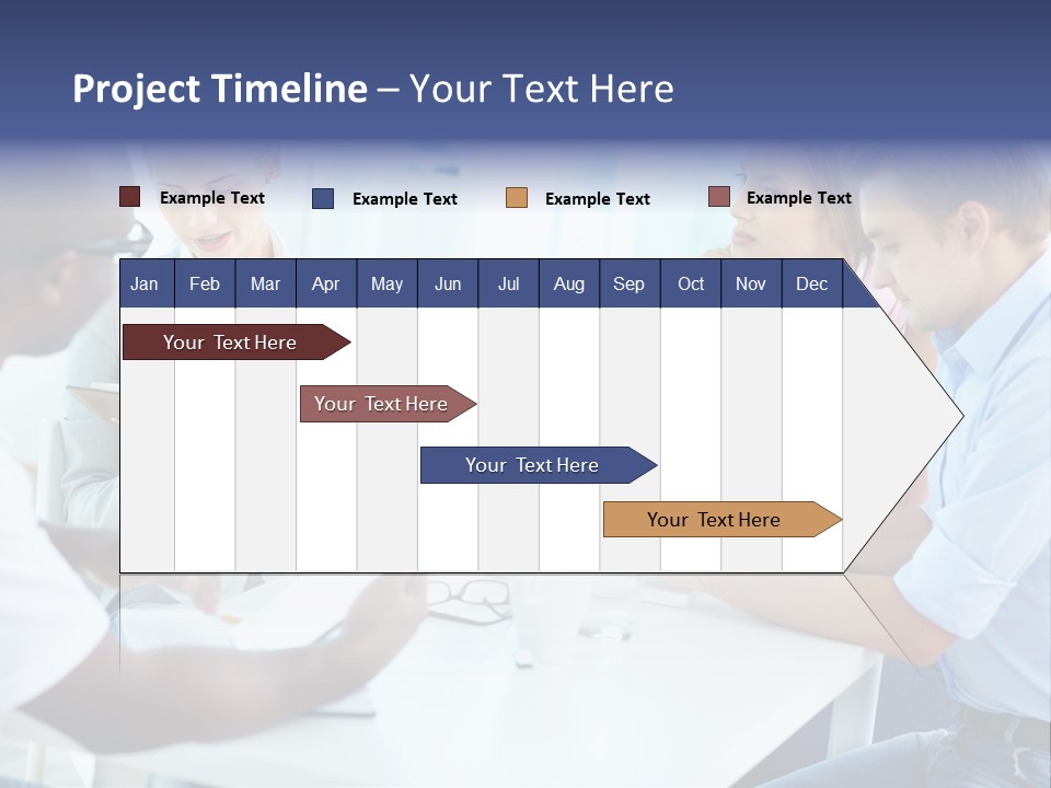 A Group Of People Sitting Around A Table With A Laptop PowerPoint Template