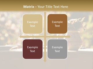 A Table Topped With Two Wine Glasses And A Vase Filled With Flowers PowerPoint Template