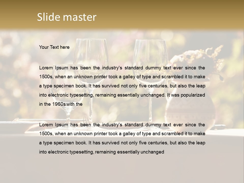 A Table Topped With Two Wine Glasses And A Vase Filled With Flowers PowerPoint Template