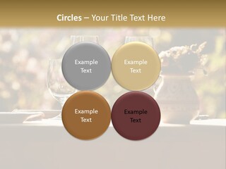 A Table Topped With Two Wine Glasses And A Vase Filled With Flowers PowerPoint Template