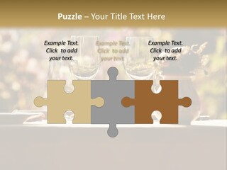 A Table Topped With Two Wine Glasses And A Vase Filled With Flowers PowerPoint Template