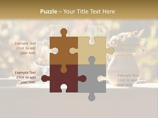 A Table Topped With Two Wine Glasses And A Vase Filled With Flowers PowerPoint Template