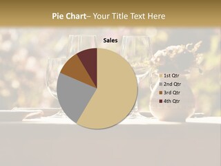 A Table Topped With Two Wine Glasses And A Vase Filled With Flowers PowerPoint Template