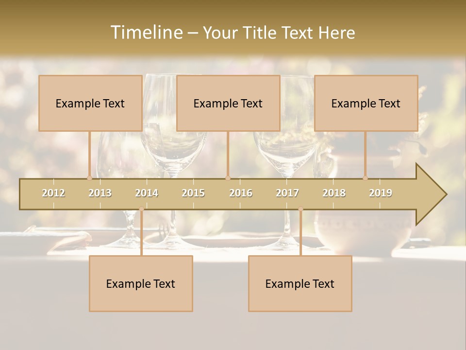 A Table Topped With Two Wine Glasses And A Vase Filled With Flowers PowerPoint Template
