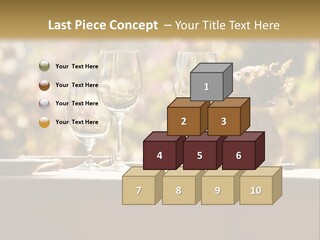 A Table Topped With Two Wine Glasses And A Vase Filled With Flowers PowerPoint Template
