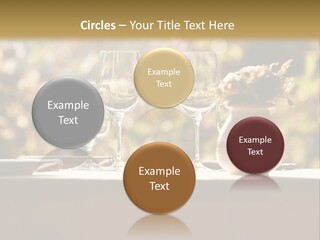 A Table Topped With Two Wine Glasses And A Vase Filled With Flowers PowerPoint Template